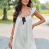 7-29_Shiftinseasons_HB_07-29-26_29329_220852.png Sweet Simplicity Oatmeal Ribbon Detail Mini Dress